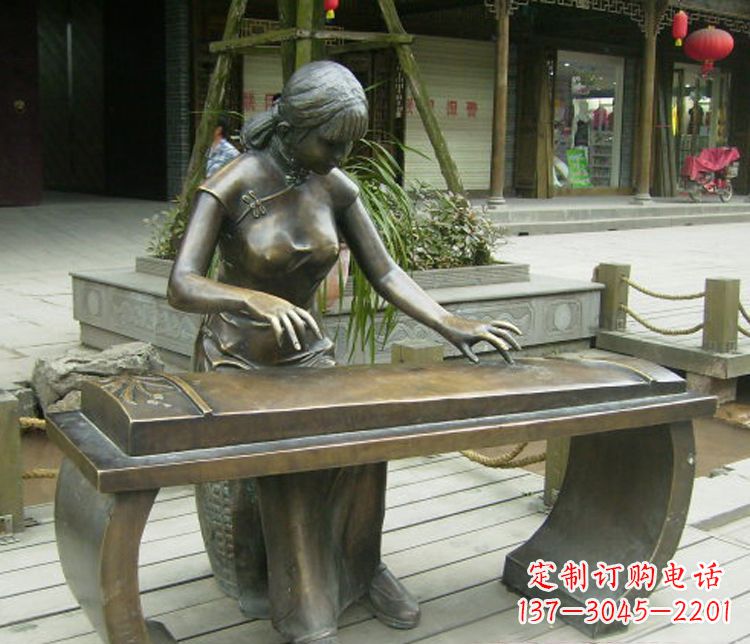 临沂铜雕现代人物弹古筝雕塑
