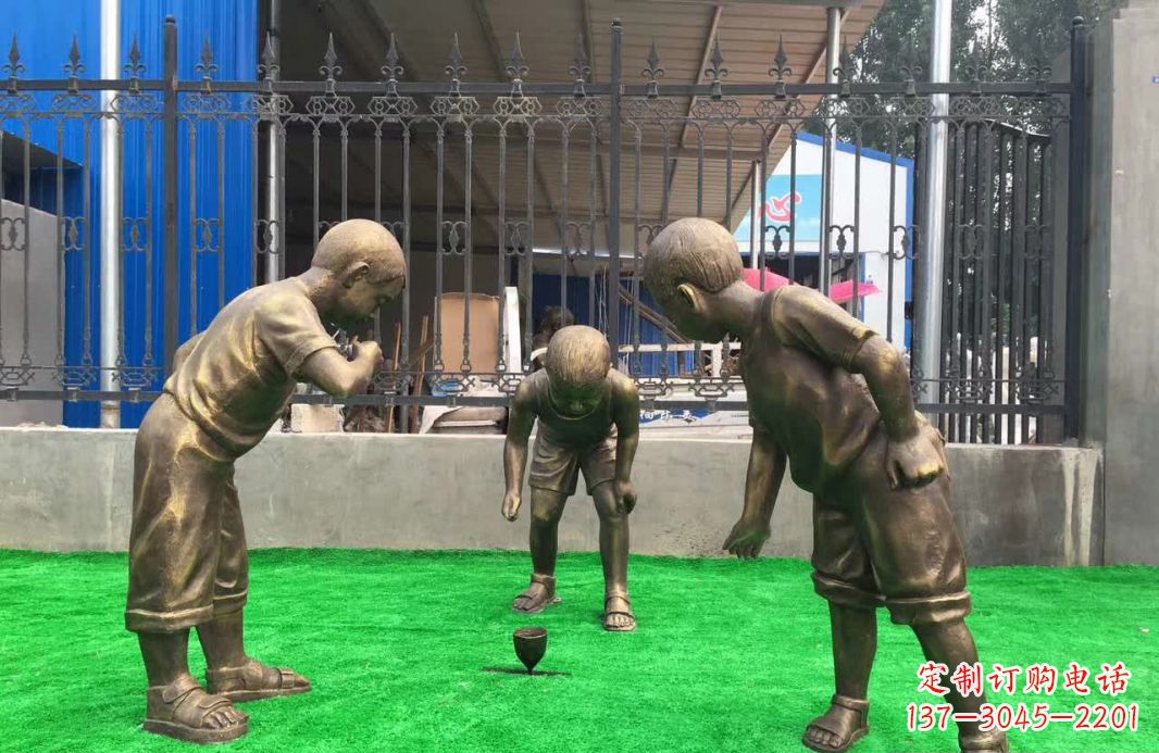 临沂玩陀螺儿童铜雕塑